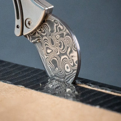 🔥Mini Titanium Compact Bottle Opener & EDC Cutter